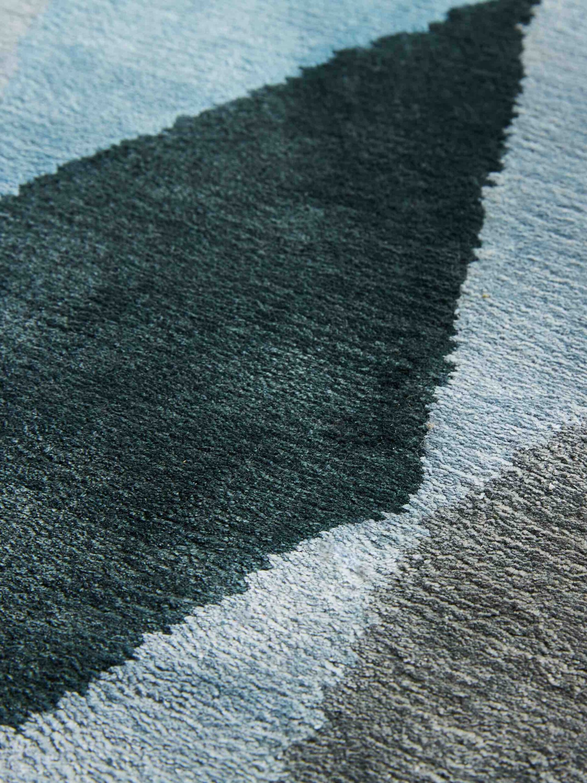 Круглый ковер синего цвета Losanghe Ubriache