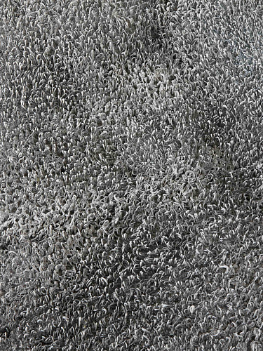 Круглый ковер алюминиевого цвета ручной работы